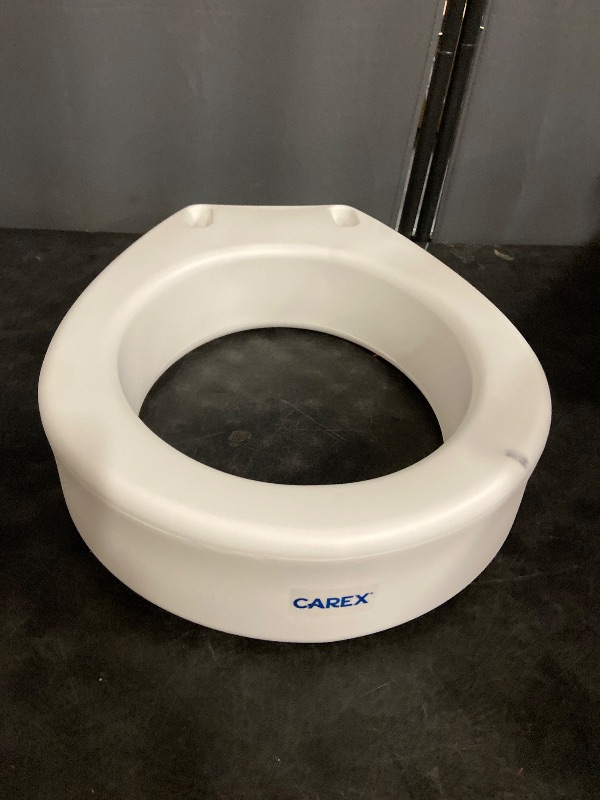Photo 1 of Carex Toilet Seat Riser, Round Raised Toilet Seat Adds 3.5 inches to Toilet Height, for Assistance Bending or Sitting, 300 Pound Weight Capacity Toilet Riser