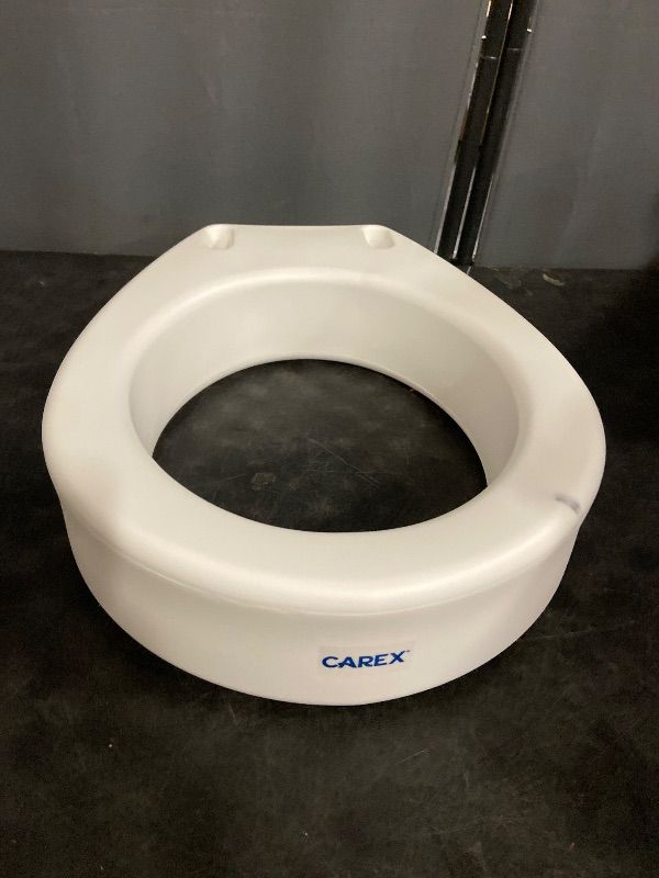 Photo 1 of Carex Toilet Seat Riser, Elongated Raised Toilet Seat Adds 3.5 inches to Toilet Height, for Assistance Bending or Sitting, 300 Pound Weight Capacity Toilet Riser