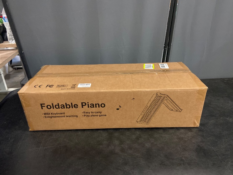 Photo 1 of BESFAN 88 Key Piano Keyboard BSP-10F Portable Folding Piano with Semi-Weighted Keys, 128 Tones, USB MIDI, Sustain Pedal, Music Stand for Beginners Gifts, Black
