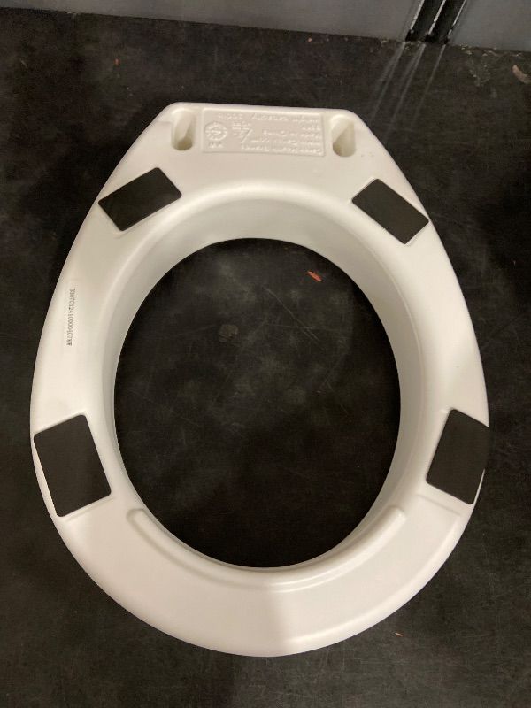Photo 1 of Carex Toilet Seat Riser, Elongated Raised Toilet Seat Adds 3.5 inches to Toilet Height, for Assistance Bending or Sitting, 300 Pound Weight Capacity Toilet Riser