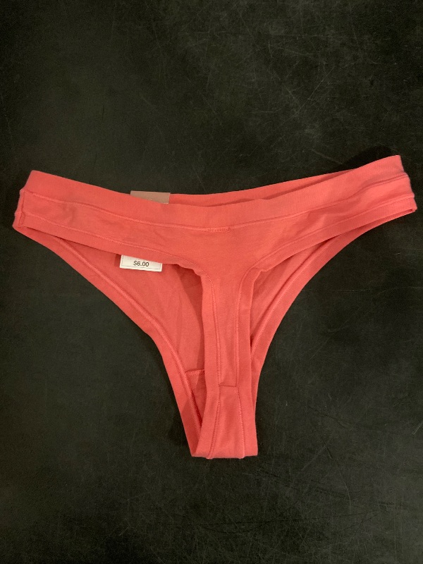 Photo 1 of Size L Women's Cotton Stretch Comfort Thong - Auden™ Coral L: Low Rise, Fold Over Waistband, Midweight Jersey, Machine Washable
