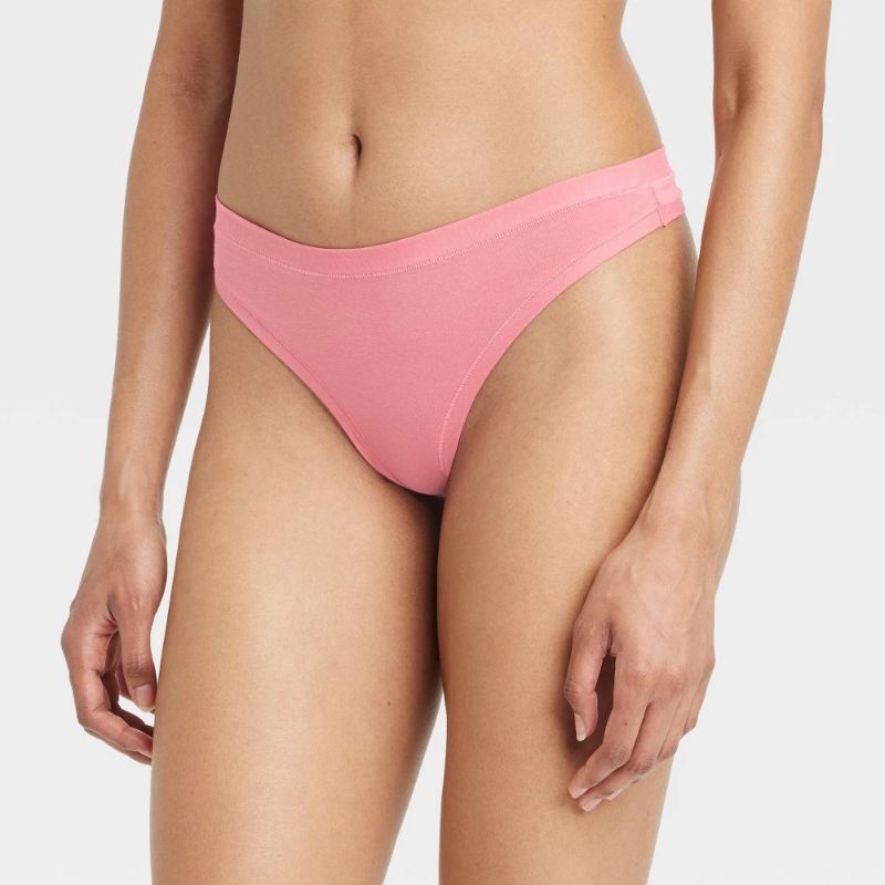 Photo 1 of Size L Women's Cotton Stretch Comfort Thong - Auden™ Coral L: Low Rise, Fold Over Waistband, Midweight Jersey, Machine Washable