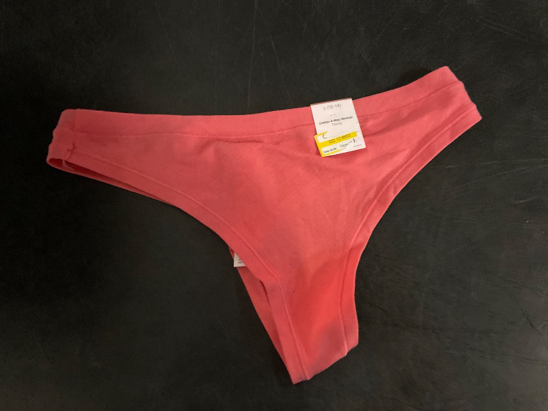 Photo 1 of Size L Women's Cotton Stretch Comfort Thong - Auden™ Coral L: Low Rise, Fold Over Waistband, Midweight Jersey, Machine Washable