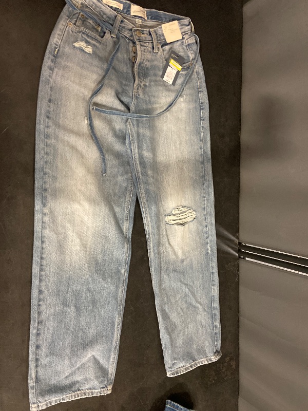 Photo 1 of Size 2 Women's Mid-Rise Tie-Waist Drawstring Baggy Jeans - Universal Thread™ Medium Wash 2: Relaxed Fit, Denim