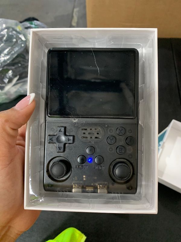 Photo 1 of PARTS ONLY ------------------------------------WYGaming R40S Pro+ Handheld Game Console, 30000 in 1 Games Mini Retro Video Console, 3.5-Inch IPS Screen,256GB TF Memory Memory,Built in 45+ Emulators,3800mAh Battery (Transparent Black 256G)
