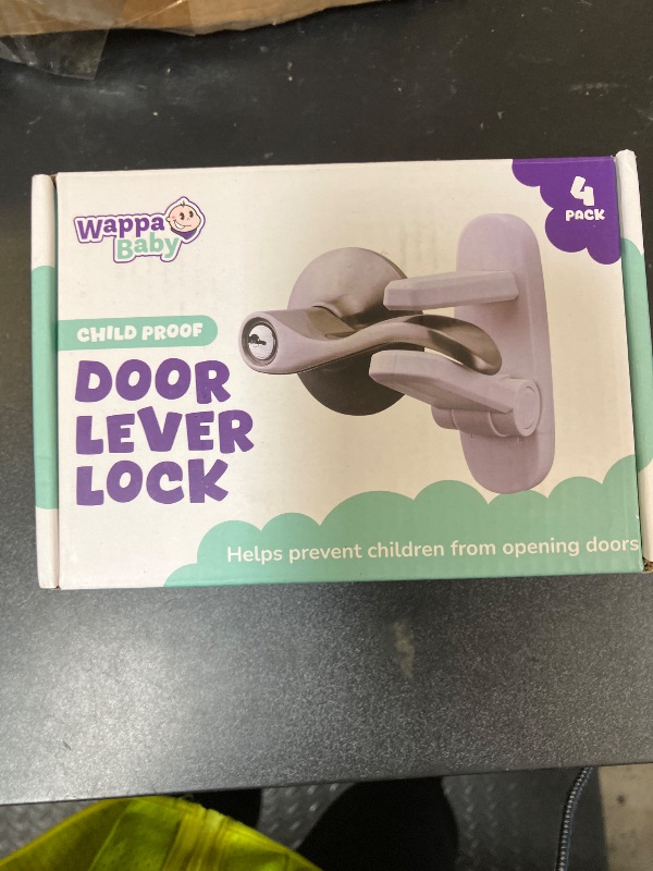 Photo 1 of Door Lever Locks (4 Pack) - Prevents Toddlers from Opening Doors - Durable ABS with 3M Adhesive - Easy One-Hand Operation for Adults, No Tools Needed
