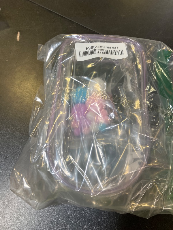 Photo 1 of Tinoaly Display Bag for Dolls, 7.68x4.13 Inch Waterproof PVC Carrying Case with Pompoms & Keychain Clear Figure Display Bag for Doll (Purple)