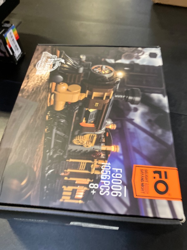 Photo 1 of FUNWHOLE Train Lighting Building Bricks Set - Steampunk Ore Train LED Light Building Set 1056 Pieces for Adults and Teens