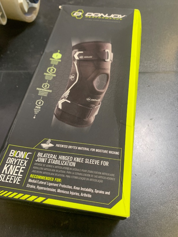 Photo 1 of DonJoy Performance Bionic Drytex Hinged Knee Sleeve, Small