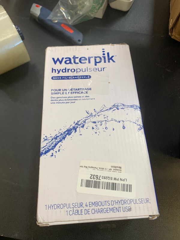 Photo 1 of Waterpik Cordless Pearl Rechargeable Portable Water Flosser for Teeth, Gums, Braces Care and Travel with 4 Flossing Tips - ADA Accepted, WF-13 White, Packaging May Vary