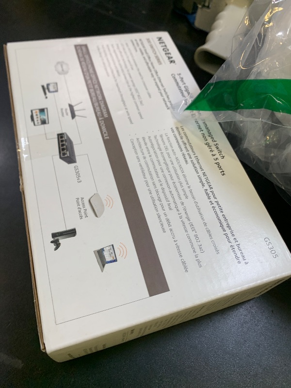 Photo 1 of NETGEAR 5-Port Gigabit Ethernet Unmanaged Essentials Switch (GS305) - Home Network Hub, Office Ethernet Splitter, Plug-and-Play, Silent Operation, Desktop or Wall Mount