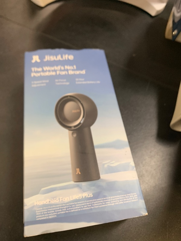 Photo 1 of JISULIFE Portable Handheld Turbo Fan [18H Max Cooling Time], 6000mAh USB Rechargeable Personal Battery Operated Lash Small Pocket Fan with 5 Speeds for Travel/Outdoor/Vacation/Concerts- Black