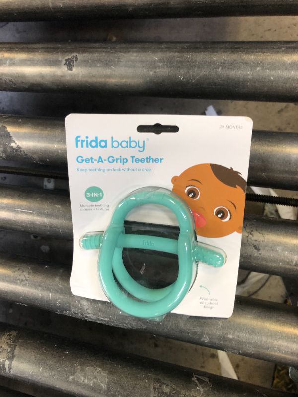 Photo 1 of Frida Baby Get-A-Grip BabyTeether for Teething Relief | 100% Food-Grade Silicone Teething Toys for Baby 0-6, 12, 18 Months Infant, BPA-Free, PVC-Free | Teal