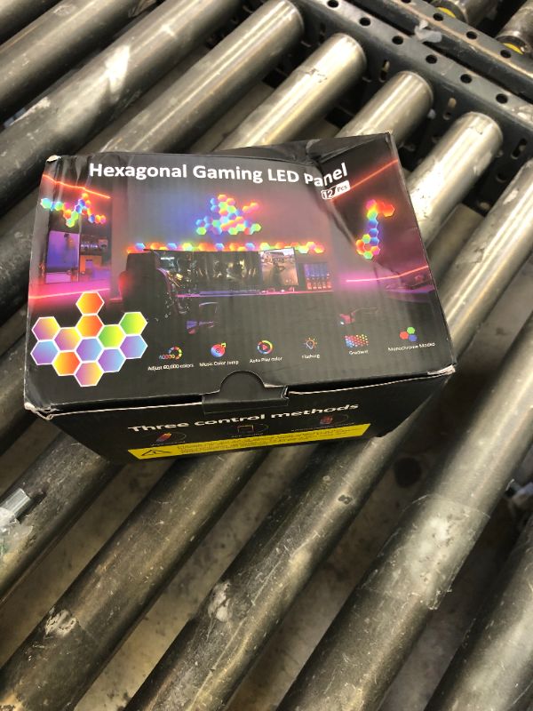 Photo 1 of 12-Pack Hexagon Light Panels – Smart RGB LED Wall Lights with APP & Remote Control – Music Sync Gaming Lights & Wall Decor for Living Room, Bedroom, Kids, and Adults