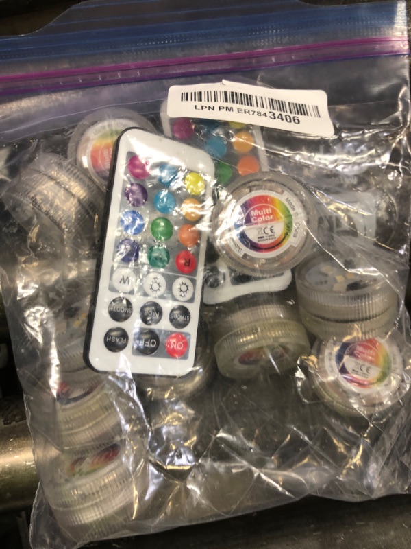 Photo 1 of Halloween Pumpkin Jack-O-Lantern Lights with Remote - 10pcs 1.5" Multicolor LED Disks Operated by CR2450 Batteries with Strobe Mode 15 Days Standby 36 Hours Runtime for Halloween Decorations