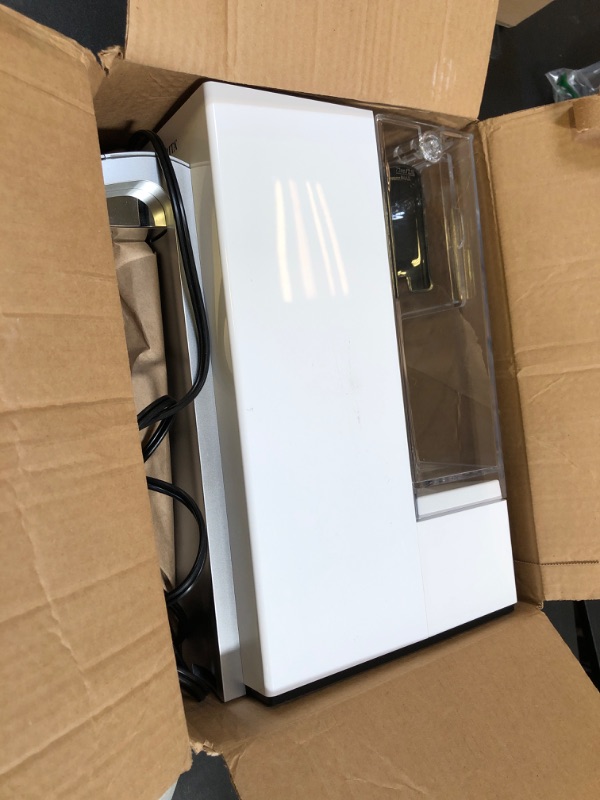Photo 1 of Brita Hub Compact Instant Powerful Countertop Water Filter System, Reduces 70+ Contaminants, 9 Cup Water Reservoir, Includes 6 Month Carbon Block Filter, White, 87344