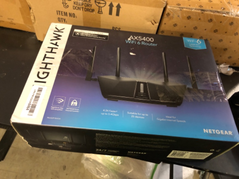 Photo 1 of NETGEAR Nighthawk 6-Stream Dual-Band WiFi 6 Router (RAX54S) – Security Features, AX5400 Wireless Speed, Up to 5.4 Gbps, Covers up to 2,500 sq. ft., 25 Devices - 1-Year Armor Subscription Included