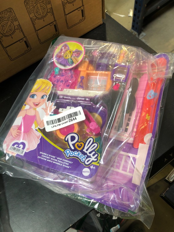 Photo 1 of Polly Pocket Compact Playset, Sparkle Stage Bow with 2 Micro Dolls & Accessories, Travel Toys with Surprise Reveals
