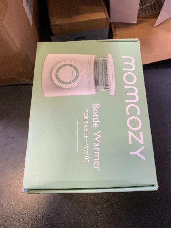 Photo 1 of Momcozy Portable Bottle Warmer for Travel, Double Leak-Proof Travel Bottle Warmer with Fast Heating, Safety Material Baby Bottle Warmer for Dr. Brown, Philips Avent, Medela, Tommee Tippee, Comotomo