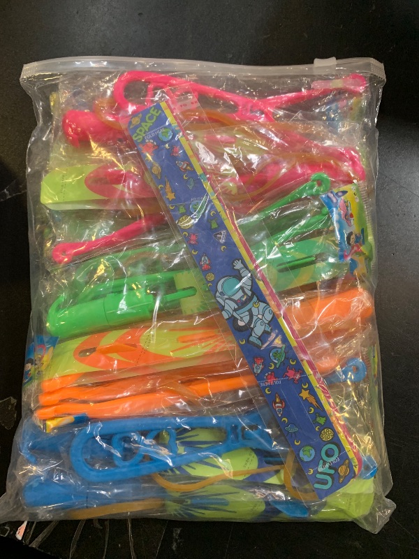 Photo 1 of JX Rocket Slingshot Flying Toys with Led Lights,12Pcs LED Arrow Helicopters + 12Pcs Launchers,Summer Outdoor Game LED Slingshot Toy for Kids, Glow in The Dark Kids Party Supplies