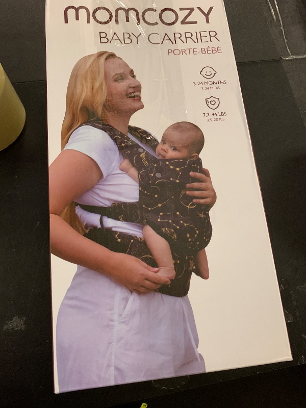 Photo 1 of Momcozy Baby Carrier - Ergonomic, Cozy and Lightweight Carrier for 3-24 Months, Effortless to Put On, Ideal for Hands-Free Parenting, Enhanced Lumbar Support, Purehug for Infant to Toddler, Black