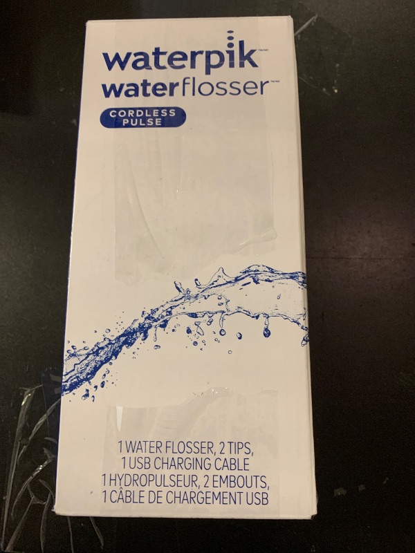 Photo 1 of Waterpik Cordless Pulse Rechargeable Portable Water Flosser for Teeth, Gums, Braces Care and Travel with 2 Flossing Tips, Waterproof, ADA Accepted, WF-20 White, Packaging May Vary