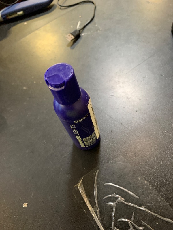 Photo 1 of Clairol Professional Shimmer Lights Purple Shampoo, 2 fl. Oz Neutralizes Brass & Yellow Tones For Blonde, Silver, Gray & Highlighted Hair Packaging May Vary