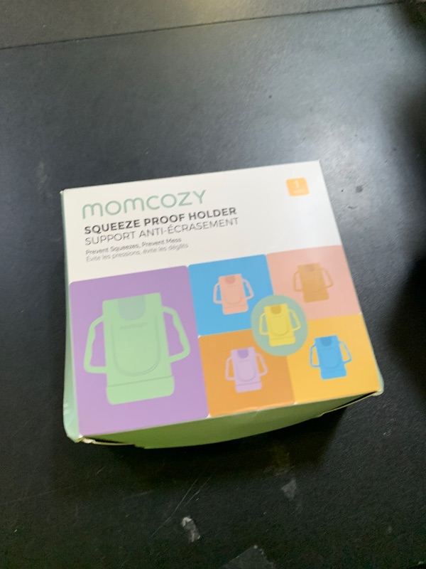 Photo 1 of Momcozy Squeeze Pouch Holder for Food Pouches and Drink Boxes, Baby Pouch Holder Allows Baby to Self-Feed and Avoid Messes, Baby Food Pouch Holder Handle is Easy to Grip, Comfortable, Pink