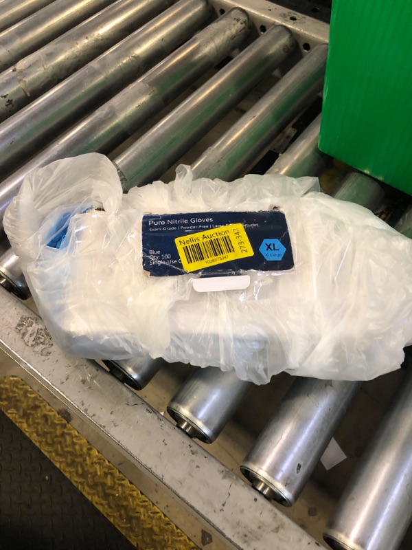 Photo 1 of Pure Nitrile Gloves Blue QTY 100 