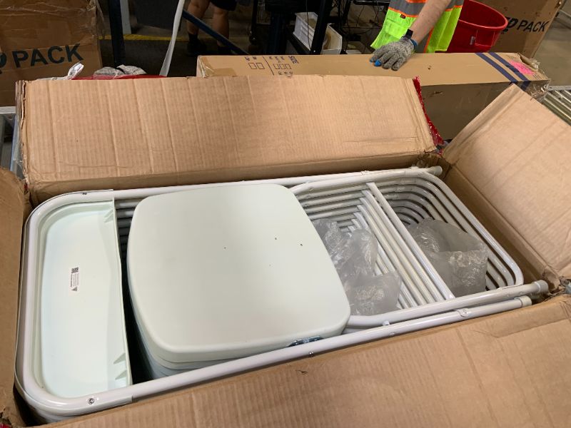 Photo 1 of PLASTIC FOLDING CHAIRS 10 PACK 