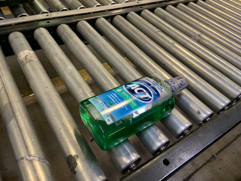 Photo 1 of ACT Restoring Zero Alcohol Fluoride Mouthwash 33.8 fl. oz. Strengthens Tooth Enamel, Mint Burst