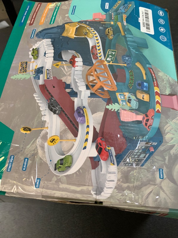Photo 1 of Toy Car Ramp Track Dinosaur Climbing Hills Railcar Colorful Vehicles Construction Play Set with 12 Mini Racer Cars and Track for Preschool Gifts Kids Ages 3 Years and Older (Dinosaur Hill)