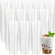 Photo 1 of Zezzxu 3 oz Mini Dessert Cups with Spoons, 100 Pack Plastic Square Shooter Cups for Serving Party Desserts Cheesecake Parfait Mousse Pudding Appetizers