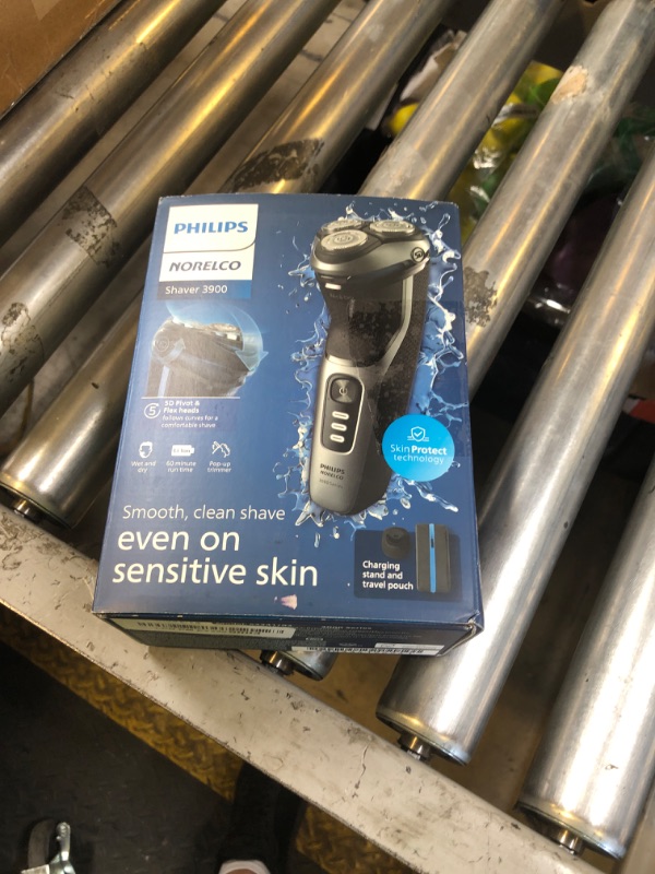 Photo 1 of Philips Norelco Shaver 3900 Series, Wet and Dry Electric Shaver, P-Cap, Travel Pouch, Charging Stand, Storm Blue, Model S3341/92