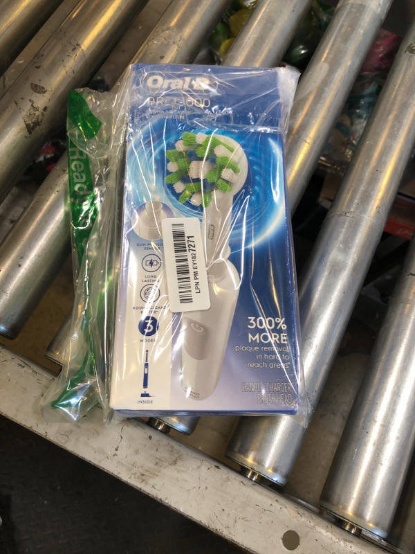 Photo 1 of Oral-B Pro 1000 Rechargeable Electric Toothbrush, White