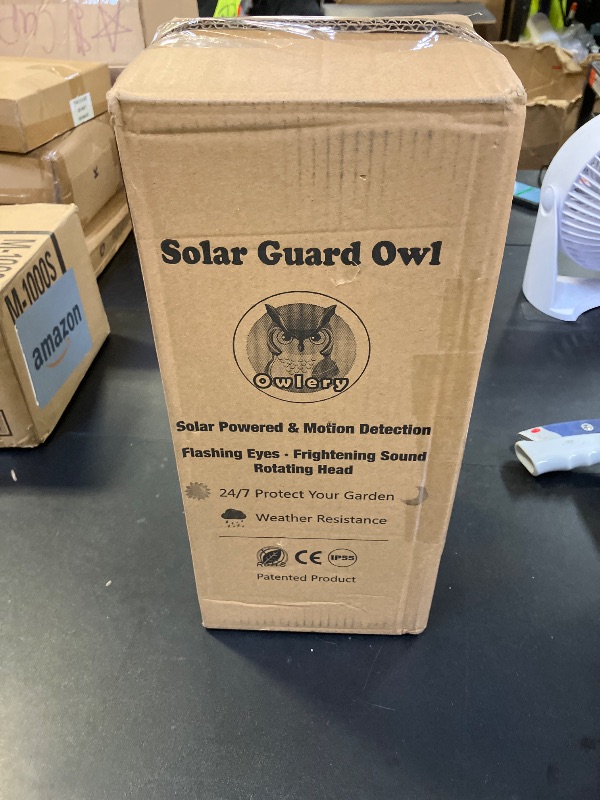 Photo 1 of Owlery Solar Owl Guard with Motion Detector, Flashing Eyes, Spinning Head, Realistic Hooting and Silent Mode, Garden Owl, Outdoor Statue, Decoration for Home, Garden, Patio and Fence