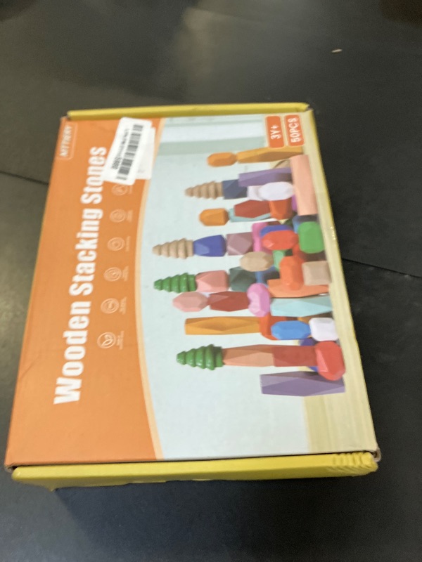 Photo 1 of 50 PCS Wooden Stacking Rocks Sensory Toys for Toddlers 3-4 Learning Montessori Building Block Toys Balancing Stacking Stones Preschool Learning Educational for Kids 3 4 5 Years Old Gifts