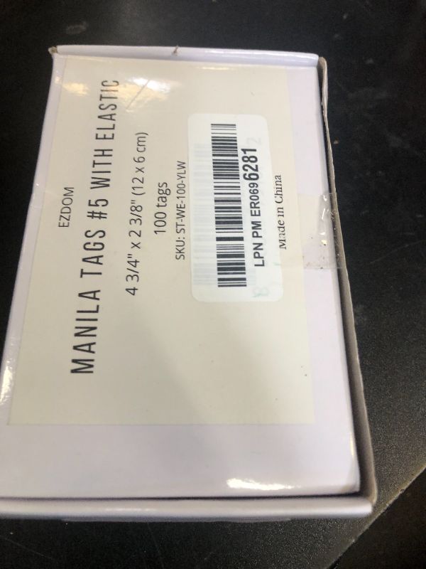 Photo 1 of Tags with Elastic String Attached - #5, 4 3/4" x 2 3/8" Box of 100 Manila Paper Label Tags with Elastic Loop and Reinforced Hole
