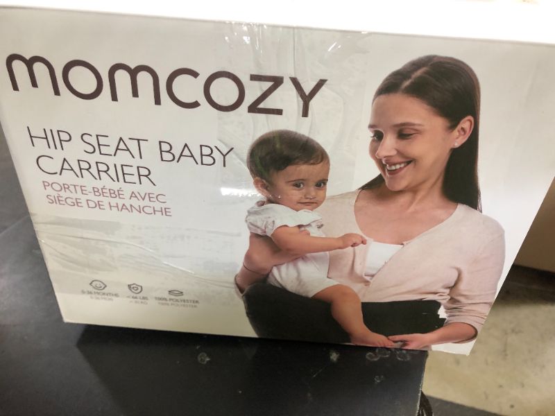 Photo 1 of Momcozy Hip Seat Baby Carrier - Adjustable Waistband with Original 3D Belly Protector, Ergonomic Carrier with Various Pockets for Newborns & Toddlers up to 45lbs (Black, Medium)