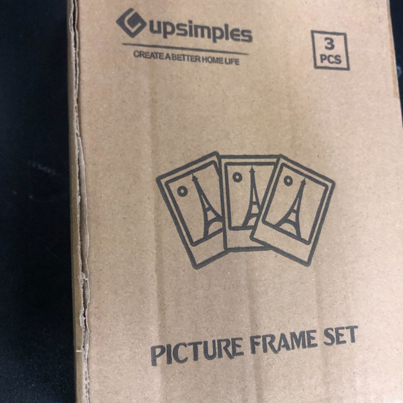 Photo 1 of upsimples 5x7 Picture Frame Set of 3, Made of High Definition Glass for 5 x 7 Black Frames, Wall and Tabletop Display Thin Border Photo Frame for Home Décor