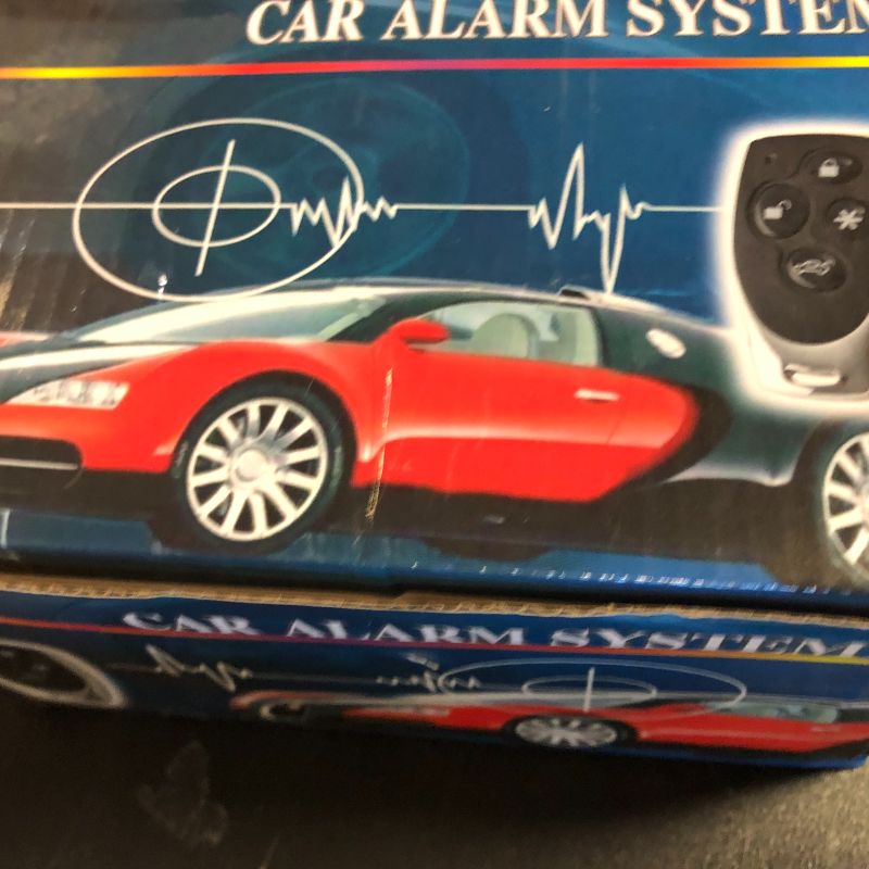 Photo 1 of Qiilu Car Security Alarm System with Shock Sensor, Universal Car Alarm Security System Keyless Entry with 2 Remote Controls