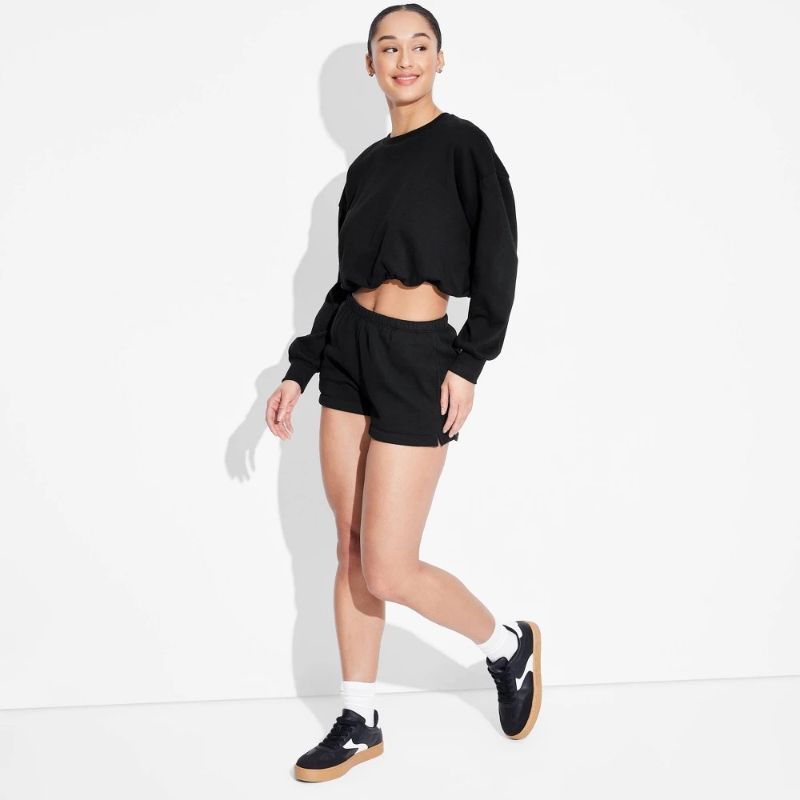 Photo 1 of (XL) Women's Mid-Rise Fleece Pull-on Shorts - Wild Fable™ Black XL: Elastic Waistband, 2.5" Inseam
