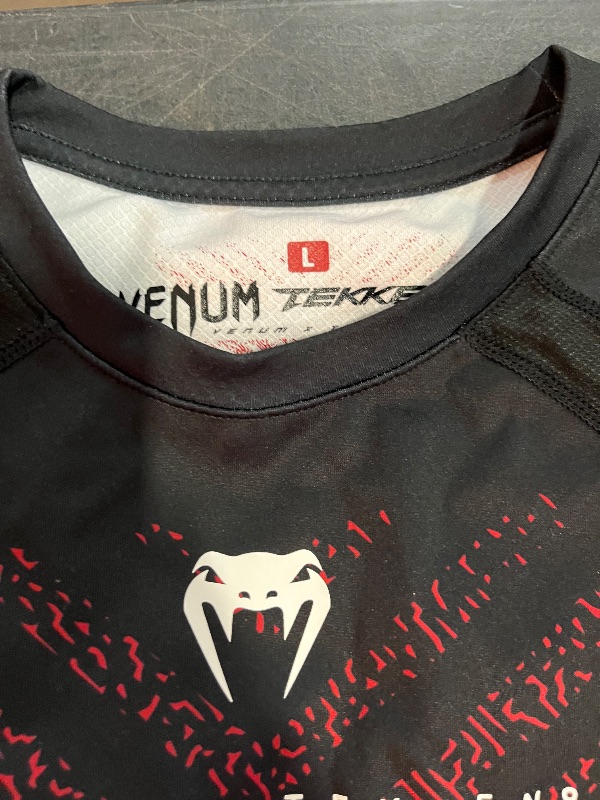 Photo 1 of (L) Venum x Tekken 8 - Marshall Law Rashguard

