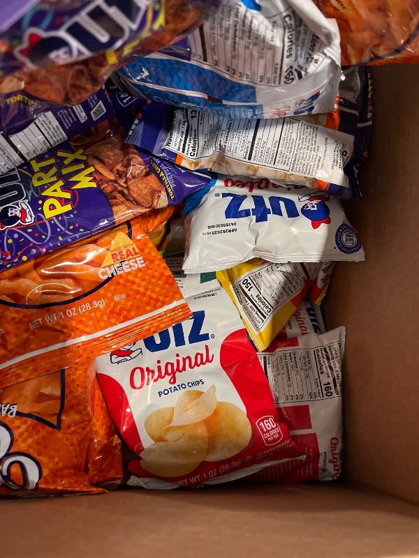 Photo 1 of Exp.04/28/25 Utz Snack Variety Pack Individual Snacks, Includes Potato Chips, Cheese Curls, Popcorn, and Party Mix, Crunchy Travel Snacks for Lunches, Vending Machines, and Enjoying on the Go (Pack of 42)

