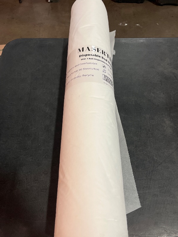 Photo 1 of Disposable Massage Bed Cover - 60 Sheets Per Roll, Non-woven Disposable Material - Ideal for Spa, Massage Table, Tattoo, Waxing Table - No Crinkle Table Sheets - 31.5 x 71 Inches (1 Roll)
