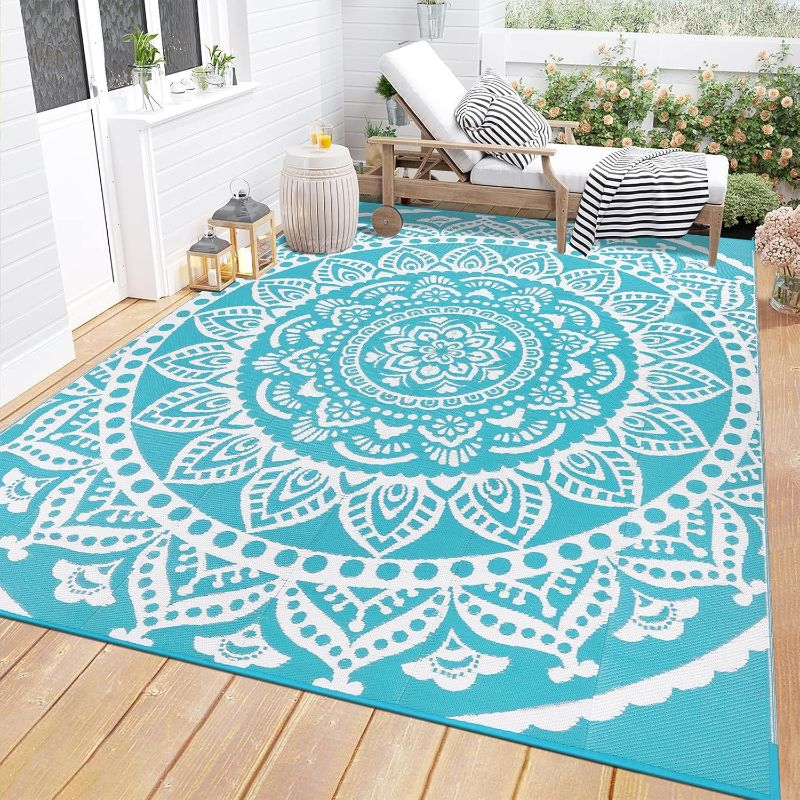 Photo 1 of Bsmathom Waterproof Outdoor Rug 6'x9' Reversible Boho Plastic Straw Patio Deck Camping Rugs, Indoor Outdoor Portable RV Mat Clearance Carpet for Outside, Porch, Balcony, Backyard, Beach, Pool,Teal

