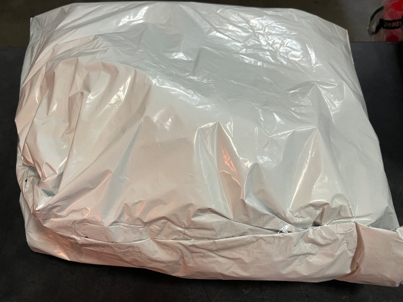 Photo 1 of NOYAL Calming Donut Dog Bed for Small to Medium Dogs & Cats - Plush Faux Fur Anti-Anxiety Pet Bed with Machine Washable Cover & Non-Slip Base