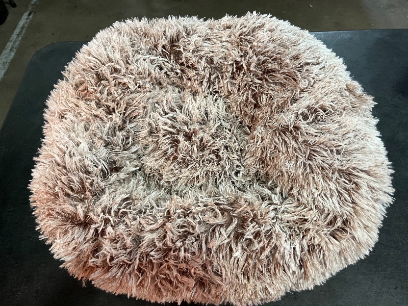 Photo 1 of NOYAL Calming Donut Dog Bed for Small to Medium Dogs & Cats - Plush Faux Fur Anti-Anxiety Pet Bed with Machine Washable Cover & Non-Slip Base