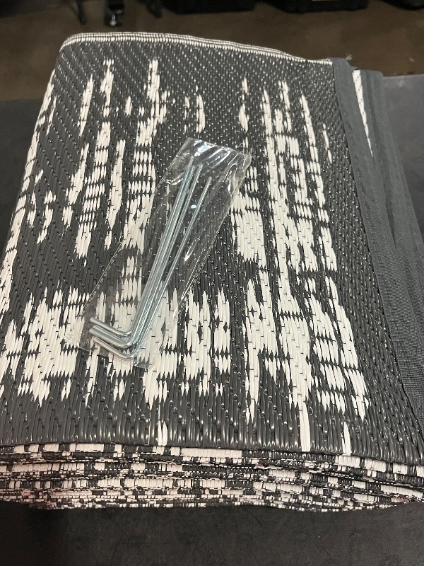 Photo 1 of MontVoo Outdoor Rug Waterproof 8x10 ft Outdoor Carpet Patio Rug Mat Reversible RV Camping Rug Plastic Straw Outside Rug for Balcony Porch Deck Picnic Beach Modern Grey
