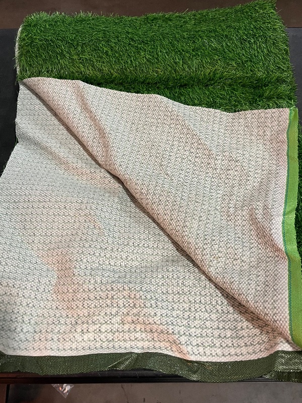 Photo 1 of Dog  Pad,51.2x31.5In Fake Grass for Dogs,Artificial Grass Pee Pad for Puppies Potty Training Indoor Outdoor